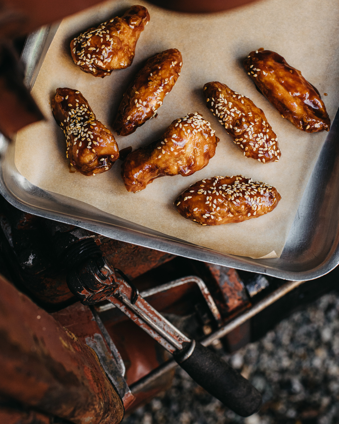 Roasted chicken wings on baking pan